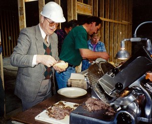 The crew and Joe Sr. enjoy a staff luncheon, 1980s
